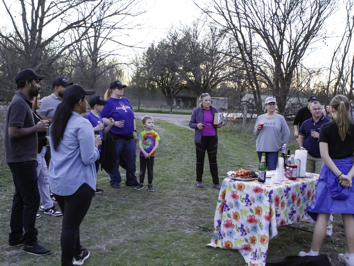 Passengers and crew gathered for the champagne toast and balloonist's prayer after a Rohr Balloons flight