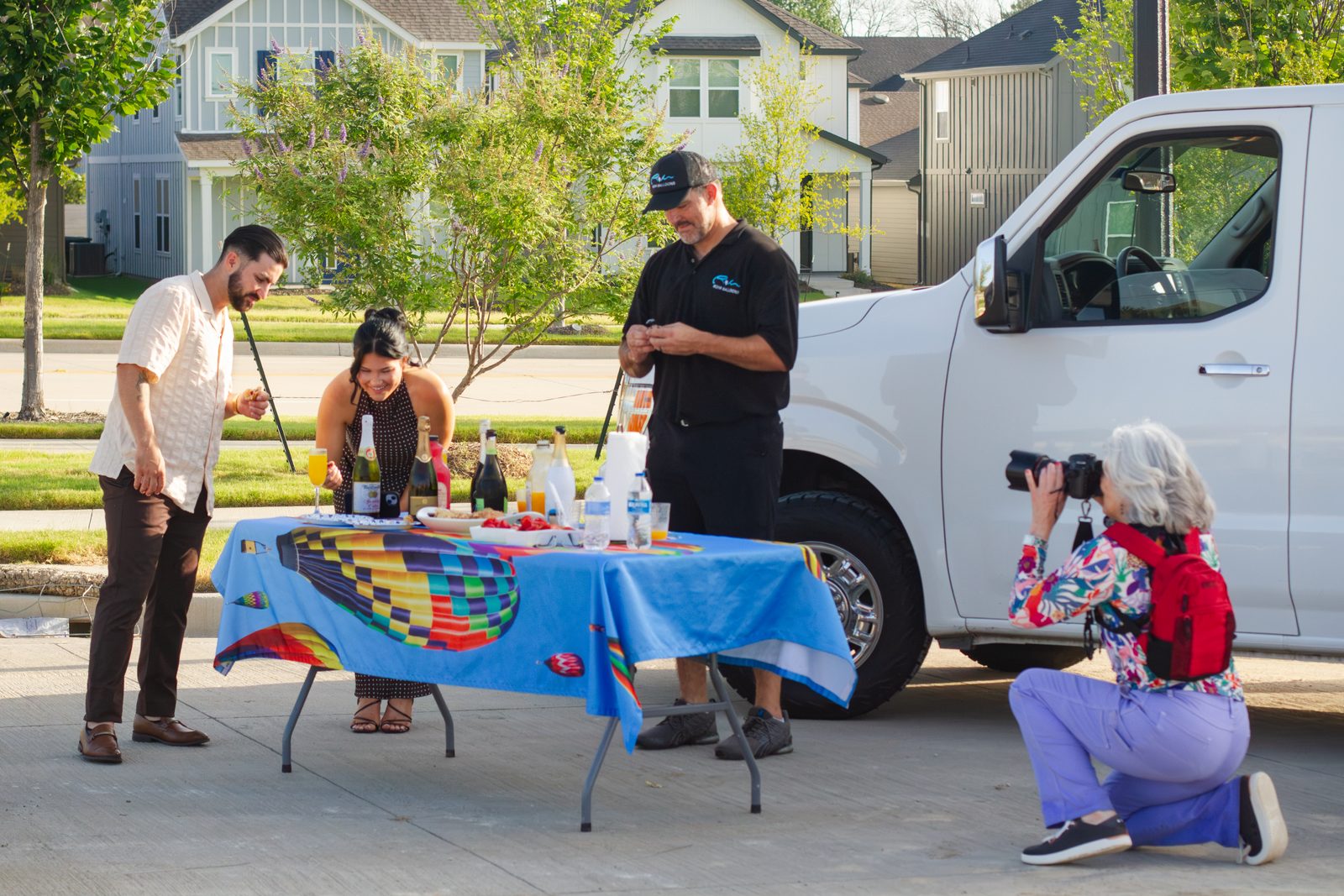 The crew sets the champagne toast table after landing